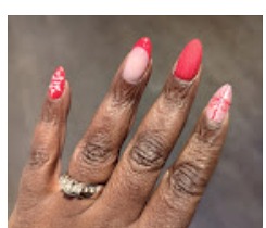 Coral pink nails with floral art